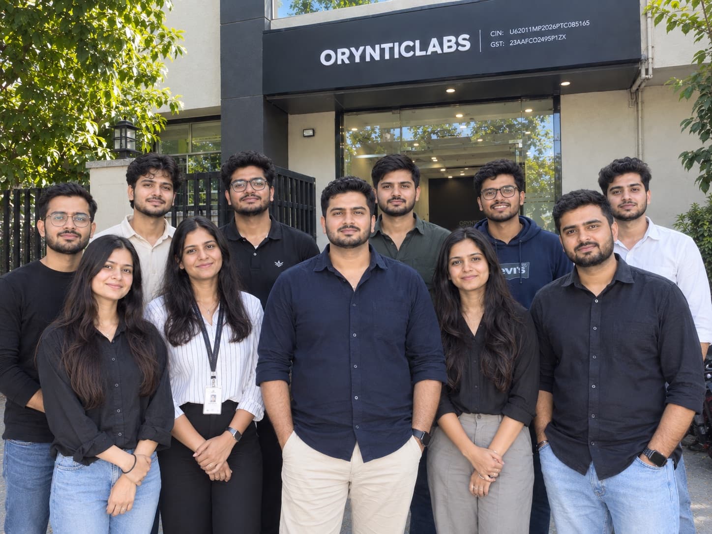 Sanjeev Kumar Gupta and the Oryntic Labs team outside the OrynticLabs office
